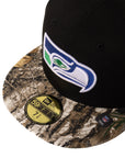 Seattle Seahawks New Era - Black with a Real Tree Camo Bill