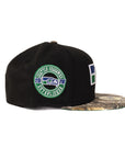 Seattle Seahawks New Era - Black with a Real Tree Camo Bill